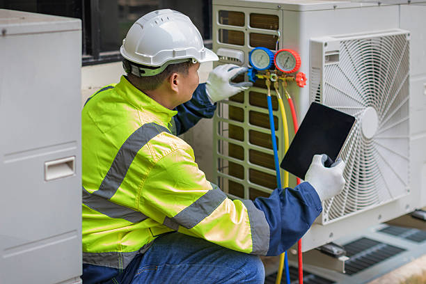 Professional Hvac technician working in Webster, MA
